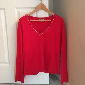 Red Burberry 3/4 sleeve shirt.
